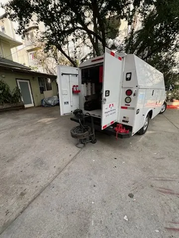 Magnet Plumbing service vehicle on-site for Grease Trap Cleaning in Litchfield Beach